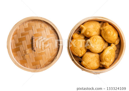 Japanese Taiyaki Fish Shaped Cake with Sweet Red Bean Paste isolated on white background. top view Japanese Taiyaki Fish Shaped Cake with Sweet Red Bean Paste isolated on white background. top view 133324109