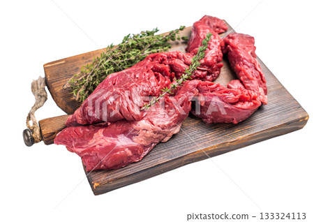 Uncooked Beef Skirt Steak, also name Machete steak, raw meat on cutting board isolated on white background 133324113