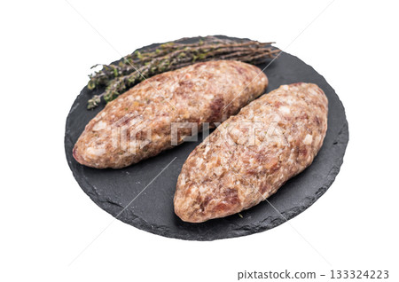 A platter of raw lula kebabs marinated in aromatic herbs, perfect for barbecuing or grilling at your next gathering. isolated on white background. top view A platter of raw lula kebabs marinated in aromatic herbs, perfect for barbecuing or grilling at your next gathering. isolated on white background. top view 133324223