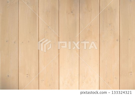 Vertical light-colored wooden planks are creating flat design backdrop showing subtle grain details 133324321