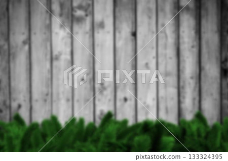 Blurred fir branches on wood Blurred fir branches on wood 133324395