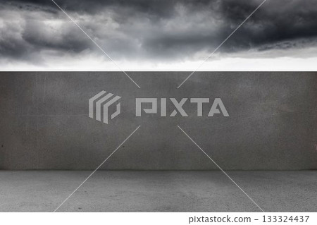 Flat design showing plain concrete floor meeting tall concrete wall under storm clouds, copy space Flat design showing plain concrete floor meeting tall concrete wall under storm clouds, copy space 133324437