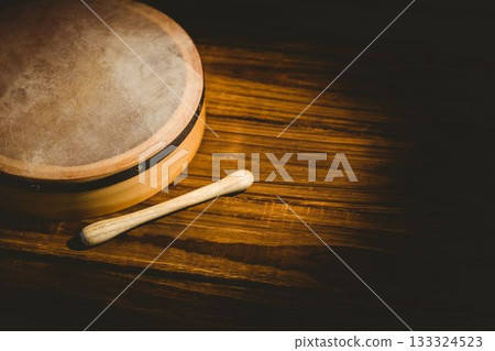 High angle view of bodhran with stick High angle view of bodhran with stick 133324523