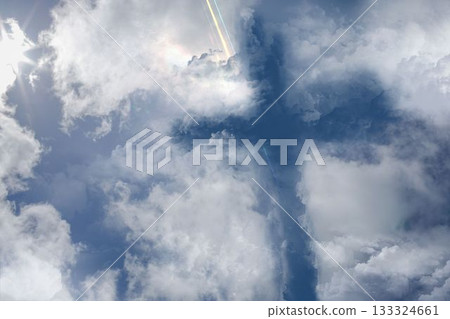 Central dense clouds forming cross shape are dominating flat design sky art with lens flares 133324661