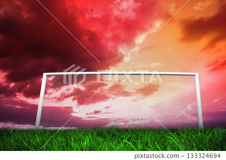 Football goal under red cloudy sky Football goal under red cloudy sky 133324694