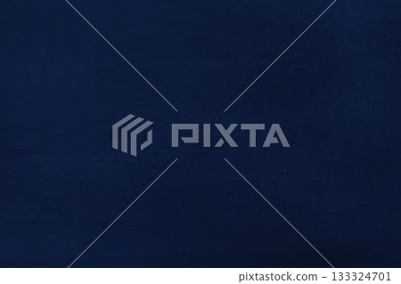 Dark navy blue textured surface is filling entire frame in flat design, showing subtle grain Dark navy blue textured surface is filling entire frame in flat design, showing subtle grain 133324701