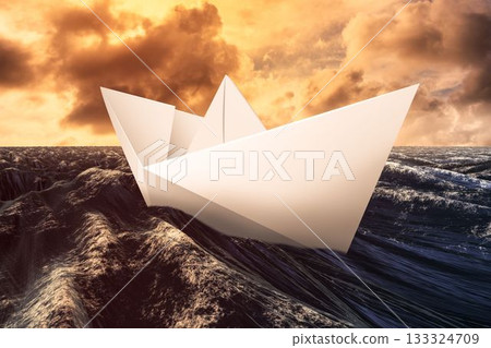 Paper boat floating on the sea 133324709