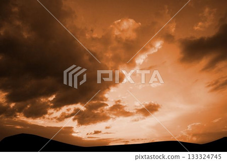 Flat design illustration is showing silhouetted sand dunes under dramatic orange cloud formations Flat design illustration is showing silhouetted sand dunes under dramatic orange cloud formations 133324745