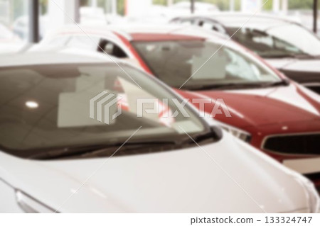 Close-up of car parked in showroom 133324747