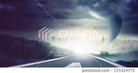 Flat design showing two lane road marked lines leading to stormy city skyline under tornado funnel Flat design showing two lane road marked lines leading to stormy city skyline under tornado funnel 133324773