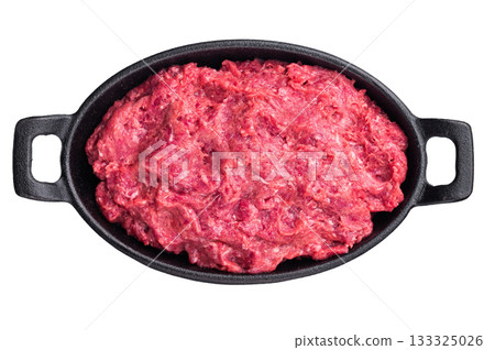 Raw minced wild game meat (venison, boar, or elk) in a black cast iron skillet. Fresh protein for gourmet and exotic recipes. Raw minced wild game meat (venison, boar, or elk) in a black cast iron skillet. Fresh protein for gourmet and exotic recipes. 133325026