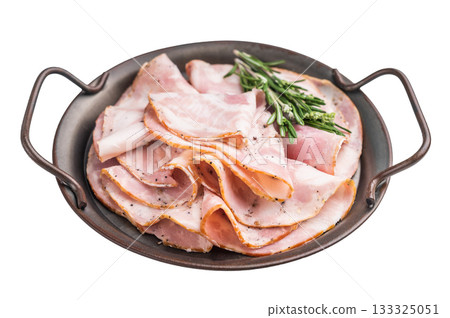 Overhead shot of cured pork deli meat (Pancetta) and fragrant green herbs on a dark industrial-style serving platter. Overhead shot of cured pork deli meat (Pancetta) and fragrant green herbs on a dark industrial-style serving platter. 133325051