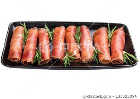 Rolled slices of dry-cured Italian ham (Prosciutto Crudo). Perfect for packaging design or a clean food menu. Rolled slices of dry-cured Italian ham (Prosciutto Crudo). Perfect for packaging design or a clean food menu. 133325054