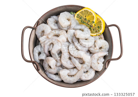 Raw peeled shrimp with lemon and thyme in a metal pan on a white background. High Key shot of a fresh ingredient. Raw peeled shrimp with lemon and thyme in a metal pan on a white background. High Key shot of a fresh ingredient. 133325057