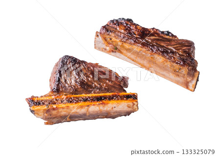 Isolated Beef Short Rib, Extreme close-up of a single, glazed beef rib on the bone, isolated on a clean white background. 133325079