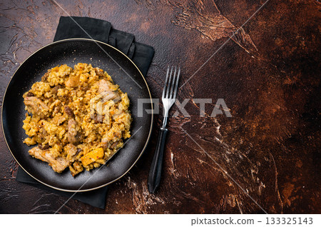 Traditional Central Asian dish Chon Kemin Valley. brown background. top view Traditional Central Asian dish Chon Kemin Valley. brown background. top view 133325143
