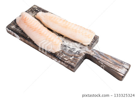 Raw cod Loin, white fish fillets without skin on wooden board isolated on white background Raw cod Loin, white fish fillets without skin on wooden board isolated on white background 133325324