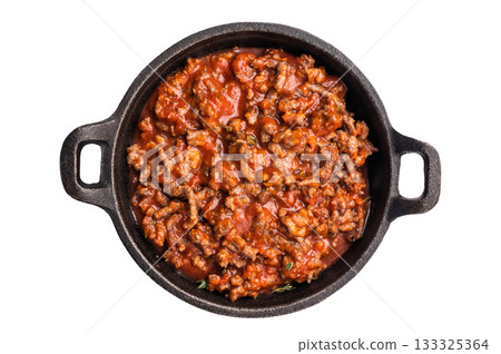 Bolognese sauce with minced beef and herbs in a skillet isolated on white background 133325364
