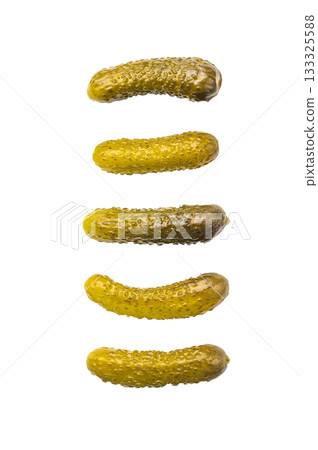 Crunchy pickled cucumbers, bursting with flavor, perfect for sandwiches, salads, or as a tangy snack. isolated on white background 133325588