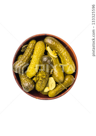Pickled Gherkins beautifully arranged and ready to elevate your culinary creations with their bold taste. isolated on white background. top view Pickled Gherkins beautifully arranged and ready to elevate your culinary creations with their bold taste. isolated on white background. top view 133325596
