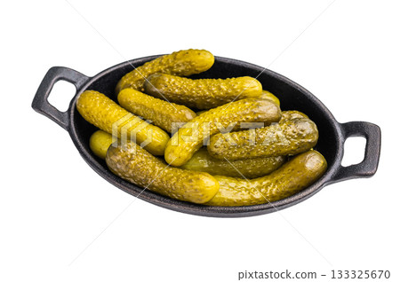 Homemade brined cucumbers, Pickled Gherkins, offering a deliciously crunchy bite that complements any dish or appetizer platter. isolated on white background 133325670
