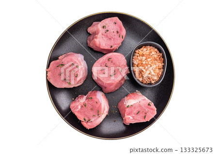 Tender fresh pork medallion, raw tenderloin meat perfect for elevating your dinner table with a touch of culinary finesse. isolated on white background. top view Tender fresh pork medallion, raw tenderloin meat perfect for elevating your dinner table with a touch of culinary finesse. isolated on white background. top view 133325673