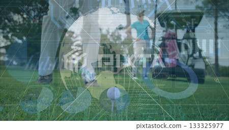 Sitting golf ball on tee with club head drawing back on fairway, showing cart, digital overlay 133325977