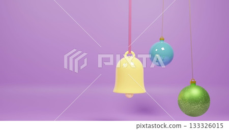 Hanging three ornaments on purple set showing yellow bell, blue bauble, green glitter, copy space Hanging three ornaments on purple set showing yellow bell, blue bauble, green glitter, copy space 133326015