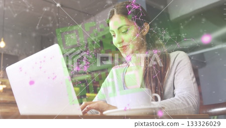 Typing woman wearing gray top using silver laptop at coffee shop, with QR overlay, copy space Typing woman wearing gray top using silver laptop at coffee shop, with QR overlay, copy space 133326029
