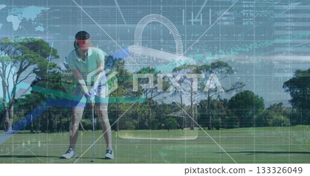 Positioning golfer wearing green polo, placing club over ball on golf fairway, with data overlays 133326049