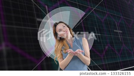 Presenting woman wearing blue blouse gesturing in virtual set, with grid and chart overlay Presenting woman wearing blue blouse gesturing in virtual set, with grid and chart overlay 133326155