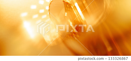 Abstract glossy golden banner panoramic background with copy space for discounts Christmas and New Year campaigns. 133326867