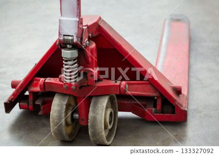 Close-up of pallet jack in warehouse Close-up of pallet jack in warehouse 133327092