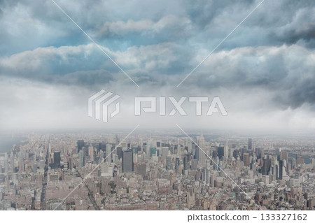 Panoramic aerial city center is being shown in flat design, featuring skyscrapers and grid streets Panoramic aerial city center is being shown in flat design, featuring skyscrapers and grid streets 133327162