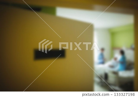 Doctor taking care of patient in hospital room Doctor taking care of patient in hospital room 133327198