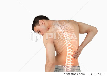 Highlighted spine of man with back pain Highlighted spine of man with back pain 133327410