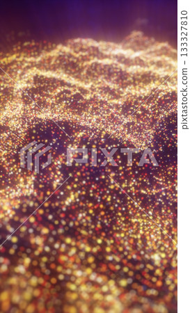 Abstract glowing golden particles forming a luminous landscape, symbolizing energy flow, digital light, and futuristic motion 133327810