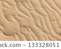 Sandy beach sand background with wave pattern, textures 133328051