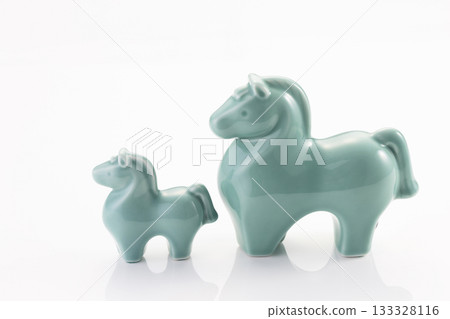 Ceramic ornament of a mother and child horse 133328116