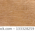 Brown synthetic leather cloth 133328259