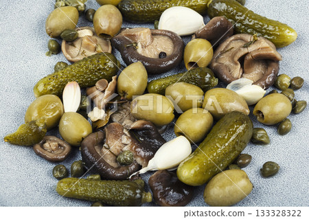 Marinated olives mushrooms and cucumbers, salted mushrooms 133328322