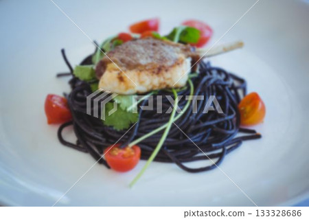 Close-up of lamb chop in plate 133328686