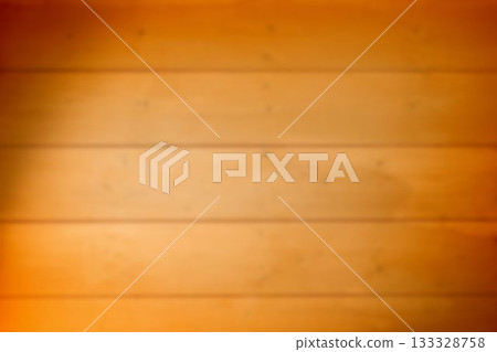 Wooden planks are appearing blurred in flat design, showing warm orange gradient, copy space 133328758