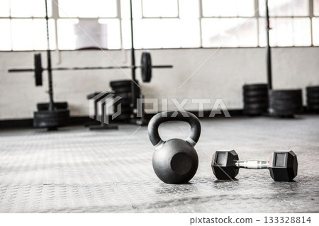 Close up of dumbbell and kettlebell 133328814