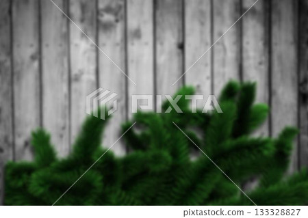 Blurred fir branches on wood Blurred fir branches on wood 133328827