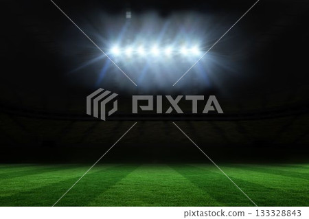 Illuminated striped grass field is shining inside flat stadium design, with floodlights glowing Illuminated striped grass field is shining inside flat stadium design, with floodlights glowing 133328843