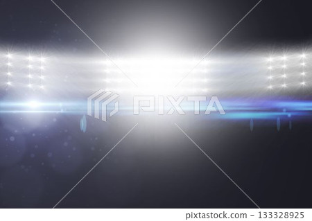 Illuminated floodlight at stadium 133328925