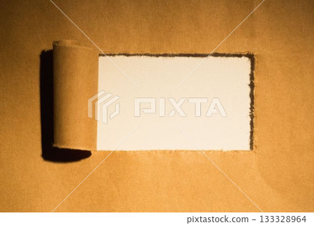 Directly above shot of torn brown paper 133328964