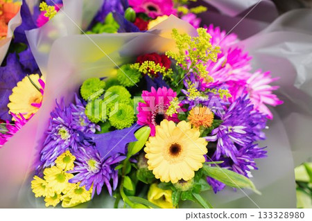 Colorful flower bouquets at market 133328980
