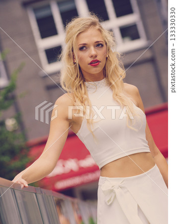 Woman wearing crop top and culottes 133330330